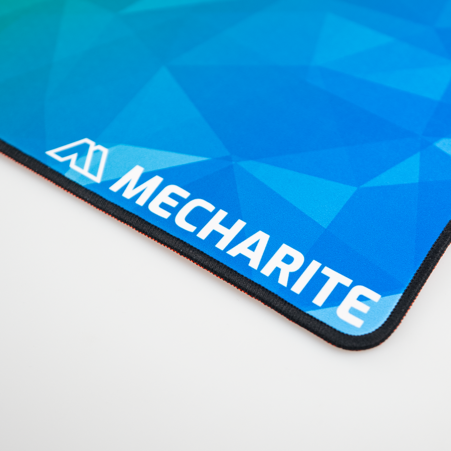 MECHARITE - Musemåtte XL - MULTICOLOR EDITION logo