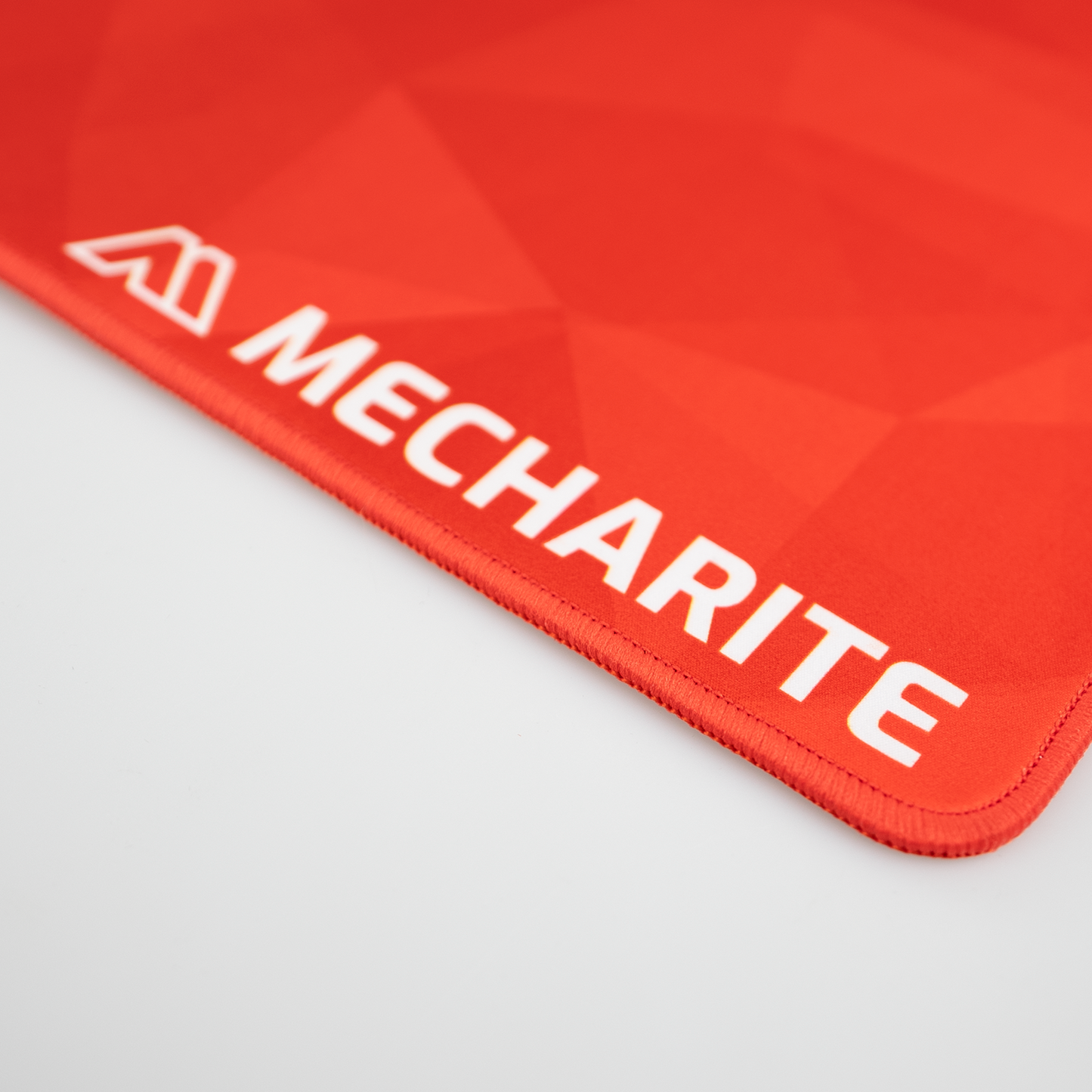 MECHARITE - Musemåtte XL - RED EDITION logo på fronten